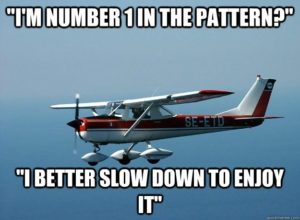 How does a pilot communicate with ATC?